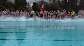 Icy Plunge for Christmas Swimmers