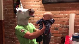 Father wears 'mystical unicorn' head mask for a whole day