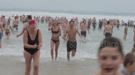 Christmas Swimmers Brave Storm Conditions