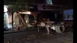 Man caught trying to loot bank with excavator in southern China