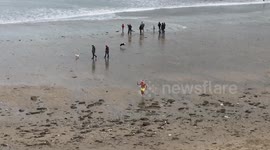 Boxing Day Swim in the sea in Cornwall in a sequin Santa hat & fluorescent shorts!