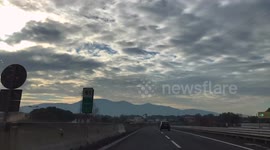 Hyper lapse video driving on the highway, with cloudy weather, in Tuscany, Italy