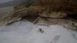 Surfer caught in rough sea while trying to collect jet ski in Nazare