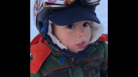 Baby Duke doing a 360 on his snowboard