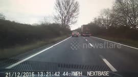 Dangerous overtaking lorry on a blind bend with oncoming traffic!