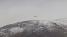 Rescue team rescue woman with broken arm on Snowdon