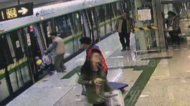 Child in pram gets stuck between metro door as man rushes in