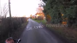 Cyclist falling off on icy road