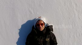 Writing massive YouTube moniker after fresh snowfall