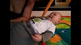 Mommy tickles baby
