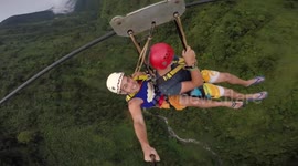 Friends ride massive zip-line in the Philippines