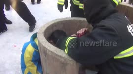 Firefighters Rescue Boy Stuck in Stone Bench in China
