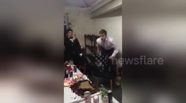 Newsflare Edit - Man faceplant into cake at Christmas party
