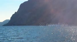 Amphibious aircraft lands on stunning lake in Italy