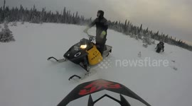 Snowmobile crash caught on GoPro