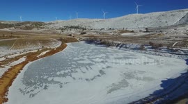 Aerial view of frozen lake in northern Greece