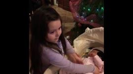 Big sister starts to cry because she loves her baby sister