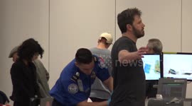 Ben Affleck gets a pat down by airport security at LAX