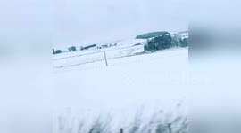 Snowy views from a train in Scotland
