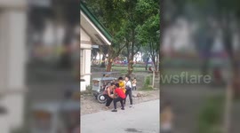Newsflare Edit - Hilarious moment young lad is thrown in the air to pluck a mango from a tree