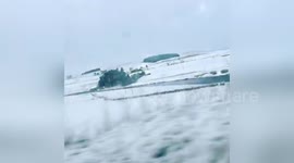 Newsflare Edit - Snowy views from a train in Scotland