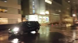 Snow starts to fall in Exhibition road in South Kensignton In London