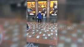 Old Woman Dancing In Street Becomes Online Hit