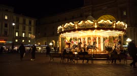 FLORENCE, ITALY - JANUARY 11 2017: Horse rides on a merry-go-round carousel on Piazza della Repubblica in Florence, Italy