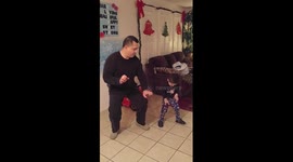 Father and his 3 year old son getting down
