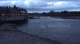 The tide arrives an hour early the night of the surge