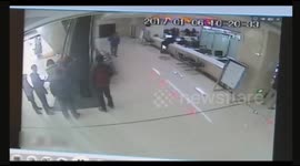 'Hero' martial artist leaps over counter to rescue elderly woman stuck on escalator