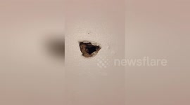 Man 'fixes' hole in wall with a slice of bread