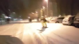 Newsflare Edit - Snowboarding on the snow-filled streets of Bulgaria