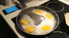 shell-shocked man cracks six double-yolk eggs in a row