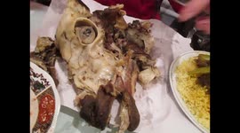 1. Eating a sheep's head in Marrakech, Morocco