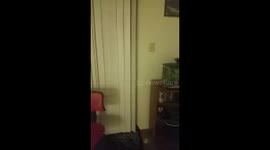 Very heavy rain outside a girl's apartment