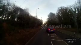 Dangerous overtake with near miss head on crash.