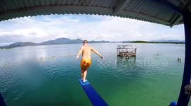 Man slips on diving board and belly flops