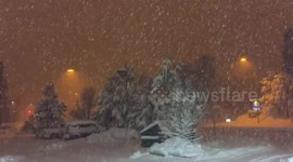 Heavy snow and reduced visibility in Flagstaff, Arizona.