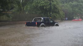 4x4 turns back driving through flooded road in Birmingham