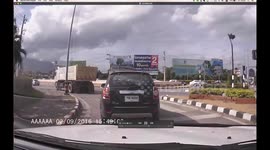 Moped driver survives being crushed by truck