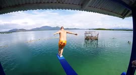 Newsflare Edit - Man slips on diving board and belly flops