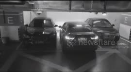 Driver parks in such a narrow space he has to climb out of his boot