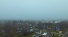 Drone flies through thick layer of fog