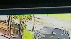 British businessman is shot dead in his Porsche just moments after leaving the gym