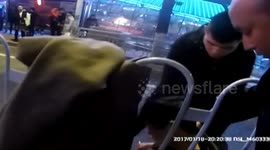 Drunk man trying to cross the road gets head stuck in central reservation in China