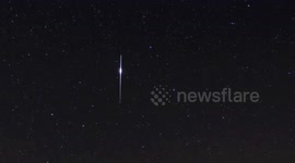 Bright iridium flare in the night sky