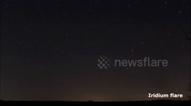 Bright iridium flare in the night sky