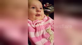 Three-month-old baby seems to say 'I love you' to her dad