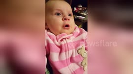 Newsflare Edit - Three-month-old baby seems to say 'I love you' to her dad